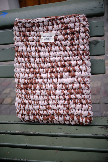 The flat white laptop sleeve